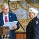 State Rep. Norman Orrall presents a citation to Mary Standish. Photo by Grace Roche