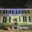 The Oliver Estate was lit up inside and out. 