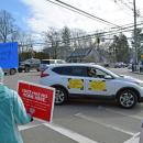 A car driving past shows its support.
