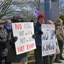 Two signs saying that America hasn't had kings since 1776.