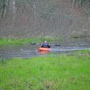 Brenda Velantzas raises her oar in success. 