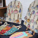 Paintings using seashells as the canvasses. 