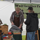A vendor shows a potential customer his product. 