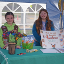 Ariella Heche and Kinsley Cooper, both age 8, promoted helping monarch butterflies at the Lakeville plant sale. 