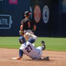 Sean Lundrigan slides onto second base. 