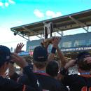 Middleboro players hold up their trophy. 