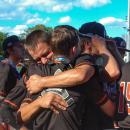 Middleboro players embrace as they celebrate their win. 