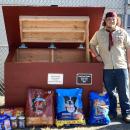 Casey Cash stands beside the new donation bin he built for the Middleboro Animal Shelter. Photo source: Troop 31