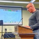Michael Milanoski, who represents the warehouse project team, speaks at an Oct. 2 Conservation Committee meeting. Photo by Christian Uva
