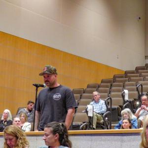 Josh Cummings speaks during the Special Town Meeting. 