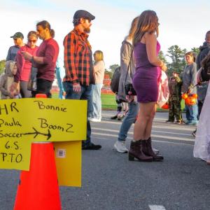 A sign tells trunk or treaters where to find the displays of various groups. 