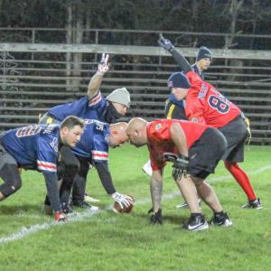 Members of the police and fire departments go head-to-head on Battis Field on Friday, Nov. 21. Photos by Grace Roche