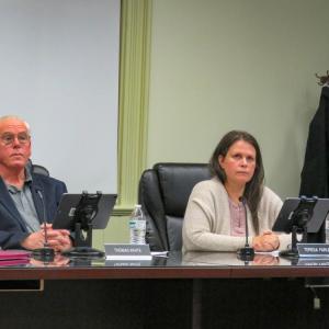 Select Board members Thomas White and Teresa Farley listen to the decision of the Charter Review Committee at the Monday, Nov. 17 Select Board meeting. Photo by Grace Roche