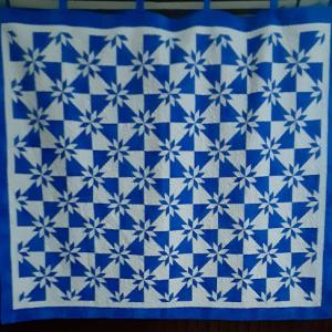 The queen-size quilt, created by a church member, craft fair attendees will have a chance to win. Photo source: Bet Giddings