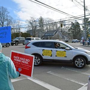 A car driving past shows its support.