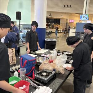 Old Colony students set up for competition at the Johnson Space Center during the NASA HUNCH culinary challenge. Photo source: Ashley Ulett