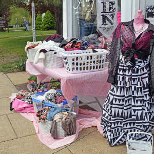 Local stores had bargain tables outside for people to browse.