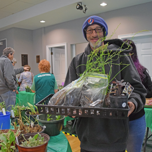 People of all ages joined in at the Oak Point sale to get some plants. 