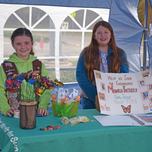 Ariella Heche and Kinsley Cooper, both age 8, promoted helping monarch butterflies at the Lakeville plant sale. 