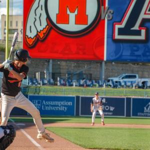 Center fielder Jayden Murphy stands at the plate. 