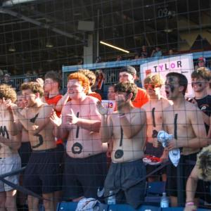 Some fans wore body paint in support of their team. 