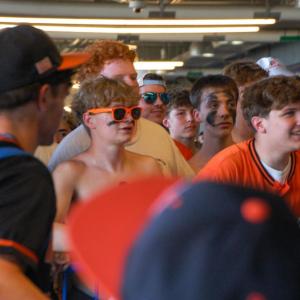 Middleboro fans look on as the victorious team makes its way off the field. 