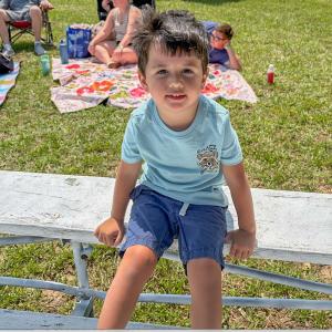 Miles Kruja, 3, takes a break. 