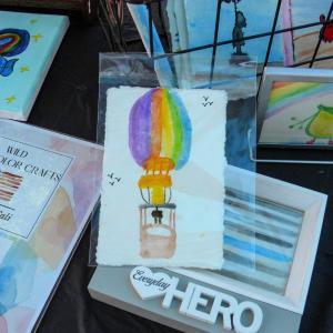 Cali Ieronimo's favorite artwork at the booth was a painting of a hot air balloon.