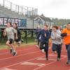Members of the Apponequet Regional High School cross country team sprint at a practice at the school Oct. 29. 