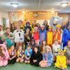 Middleboro Girl Scouts pose together during their Trick or Treat So Others Can Eat event Saturday, Oct. 25.