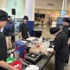 Old Colony students set up for competition at the Johnson Space Center during the NASA HUNCH culinary challenge. Photo source: Ashley Ulett