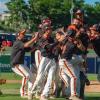 Middleboro players and coaches rush the field as the team clinched a state championship win at Polar Park on Saturday, June 13. Photos by Grace Roche
