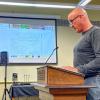 Michael Milanoski, who represents the warehouse project team, speaks at an Oct. 2 Conservation Committee meeting. Photo by Christian Uva